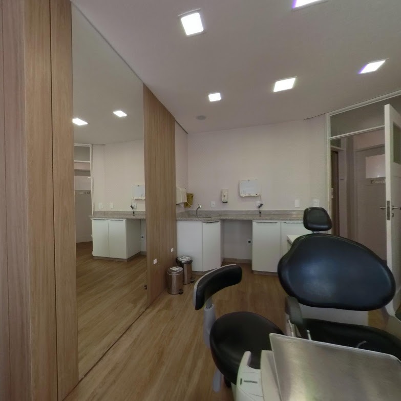Ambiente moderno e acolhedor da clínica Imbiodonto